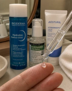 Korean glass skin close-up — hydrated, light-reflecting skin